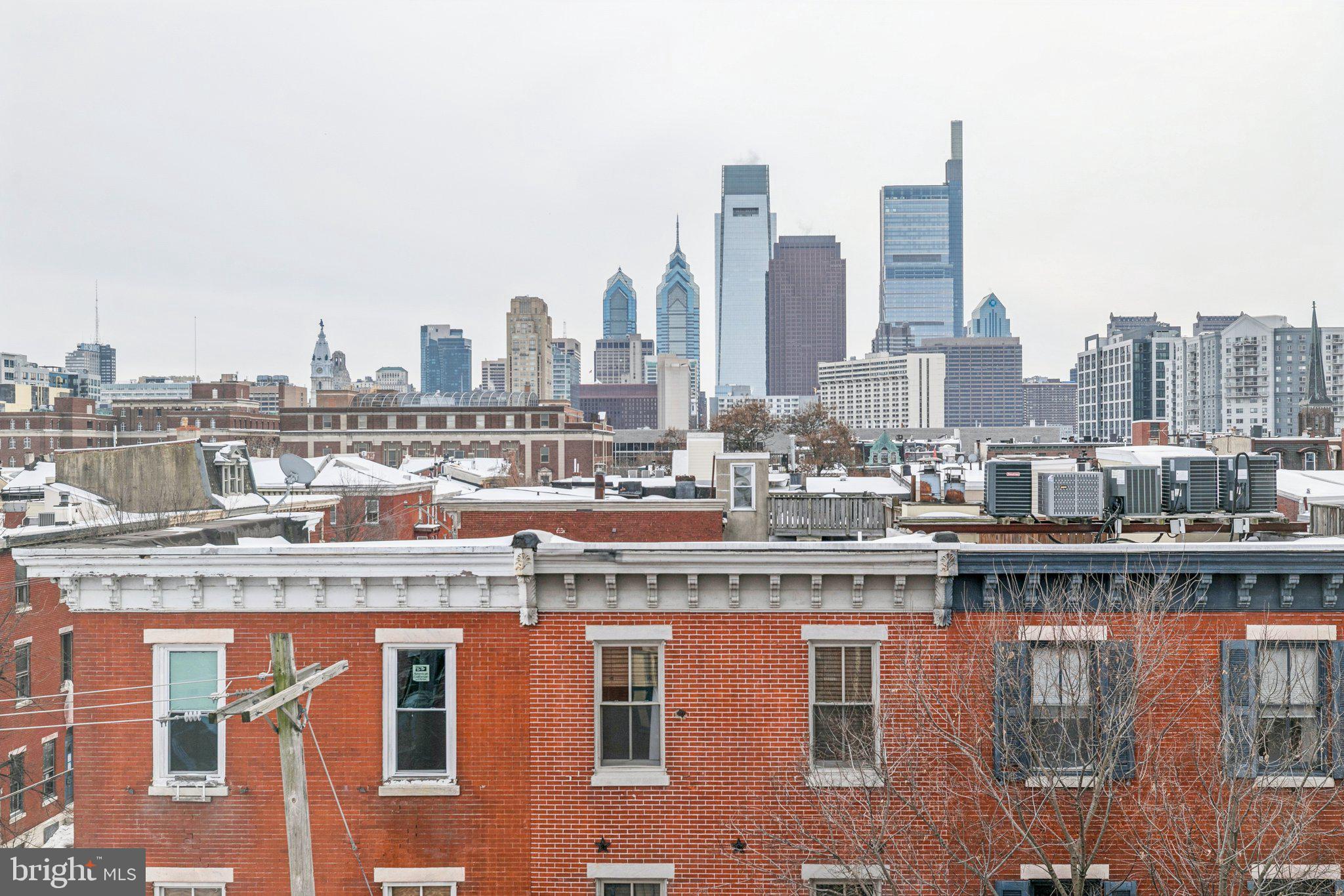 1703 Wallace Street, Unit 301 Philadelphia, PA 19130 - Photo 20 of 22 a multi story building with a city view