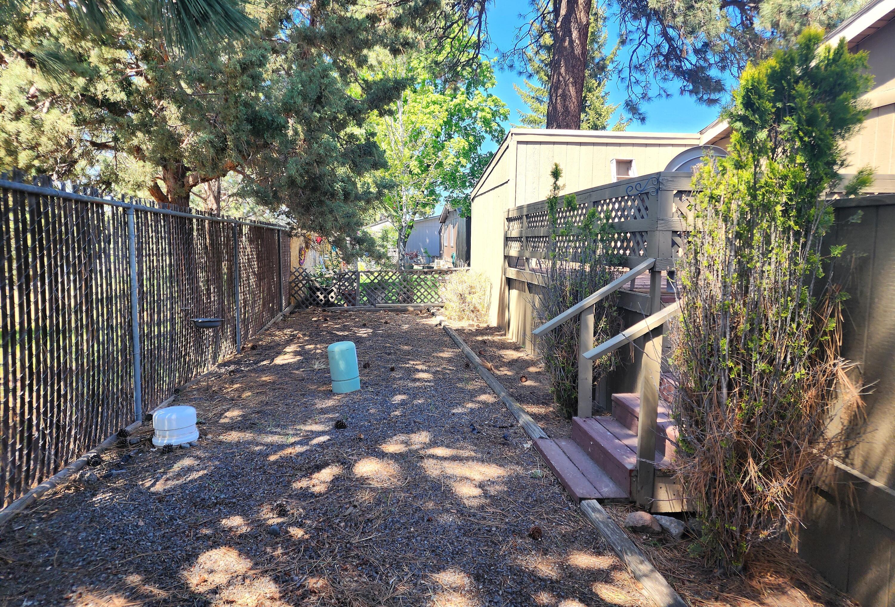 1001 Southeast 15th Street, Unit 34 Bend, OR 97702 - Photo 34 of 43 Fenced backyard