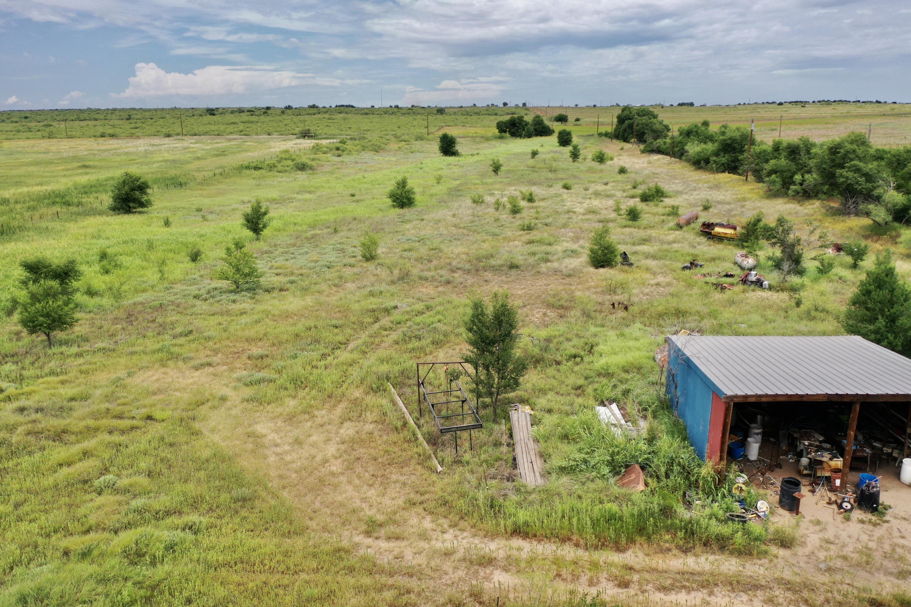 907 Co Road Turkey, TX 79261 - Photo 14 of 24 a view of a garden with an outdoor space