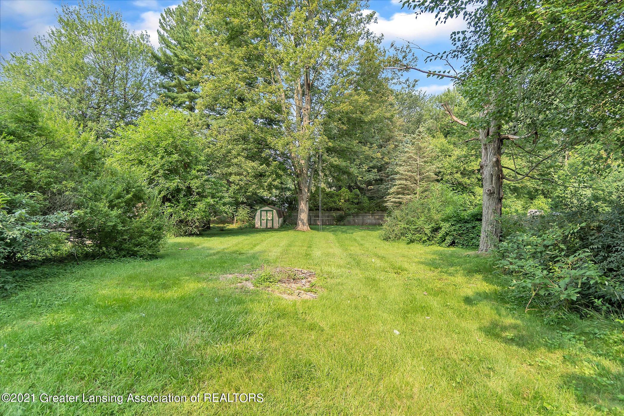 6532 Sommerset Road Lansing, MI 48911 - Photo 32 of 37 32-6532-Sommerset-Rd-WindowStill-Real-Es