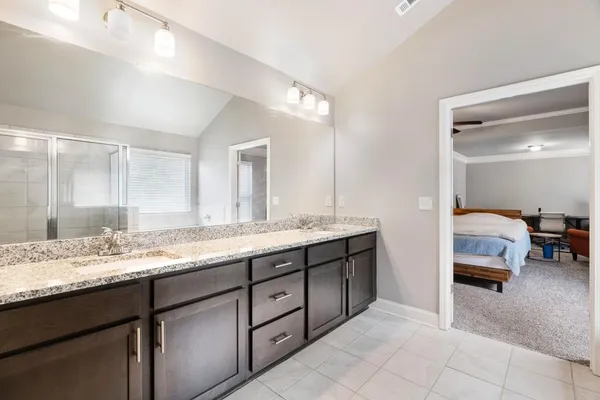 a room with a bed and a window