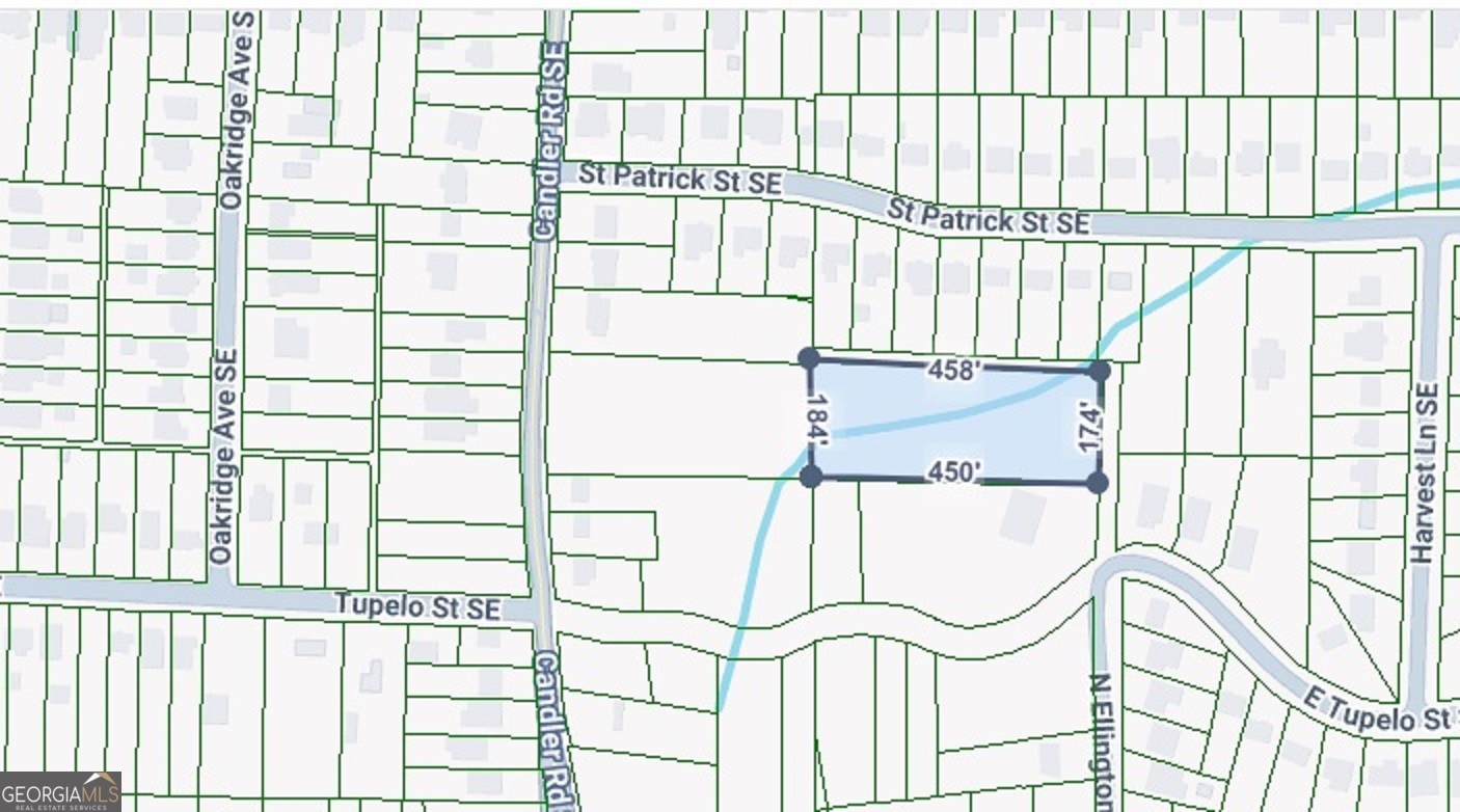 an empty room with windows and stairs