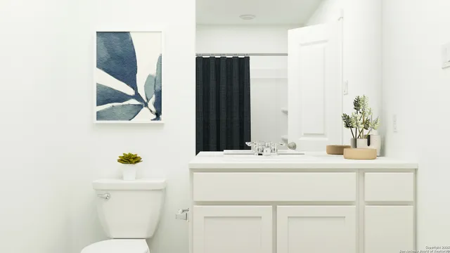 a bathroom with a sink and a toilet