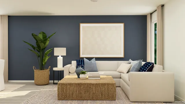 a living room with furniture and a potted plant