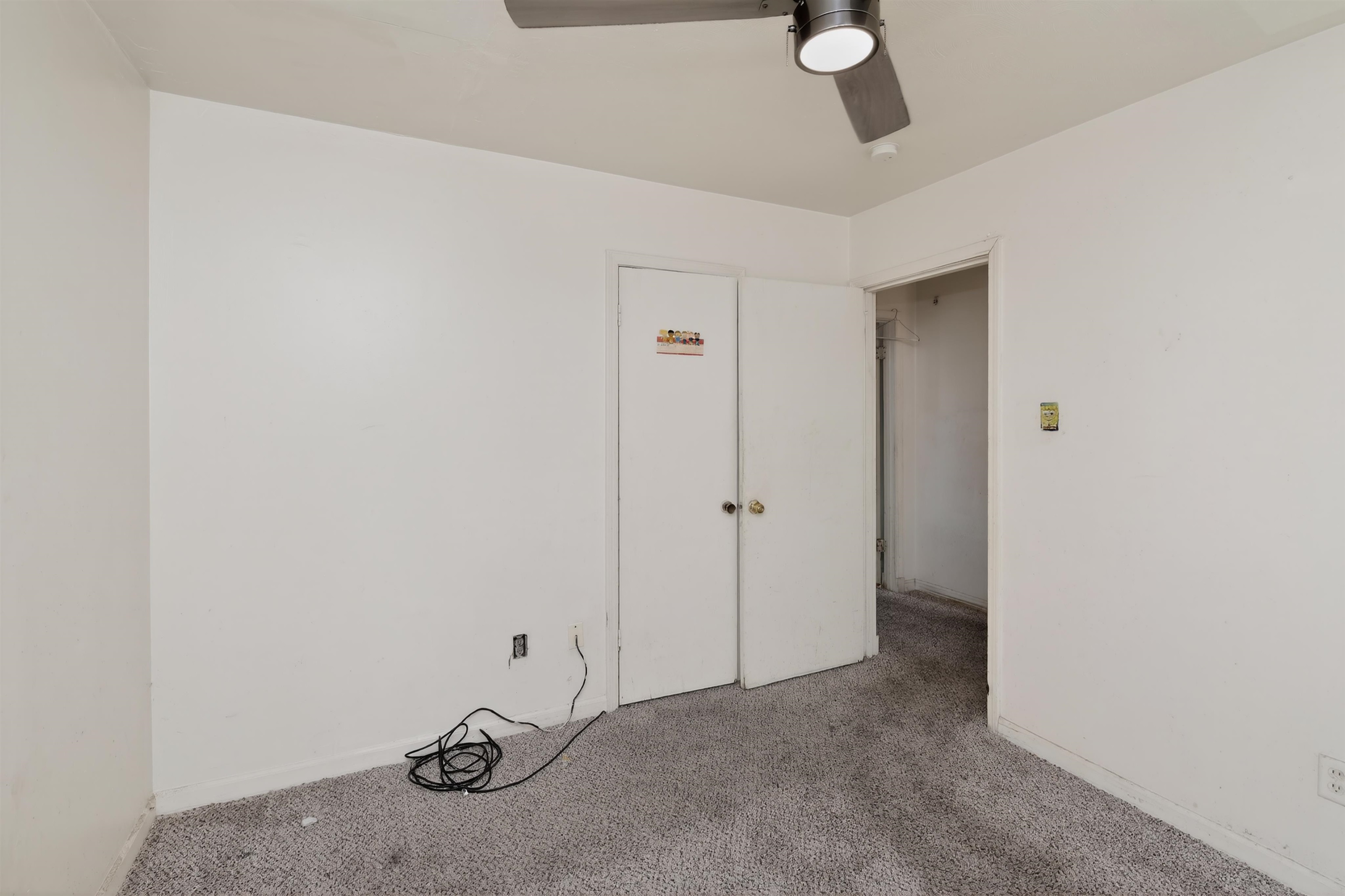3451 Birdsong Ferry Road Memphis, TN 38118 - Photo 22 of 27 Neutral-toned walls complement the gray carpeting