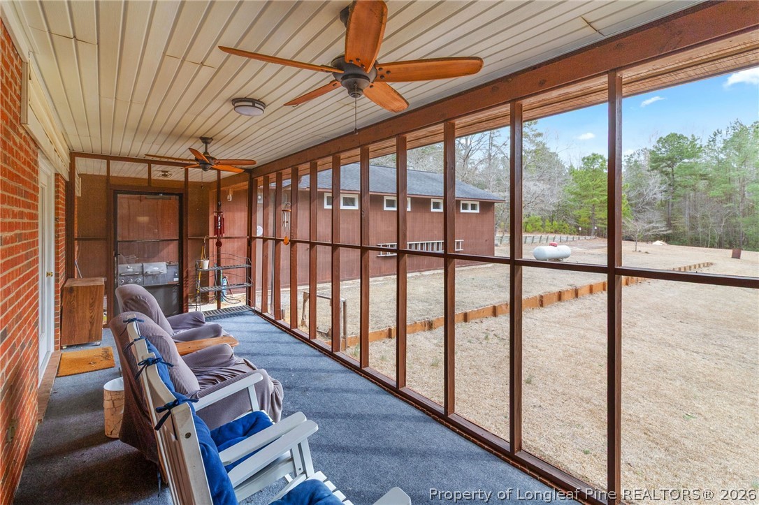 3488 School Road Fayetteville, NC 28306 - Photo 17 of 50 a view of a room with furniture and wooden floor