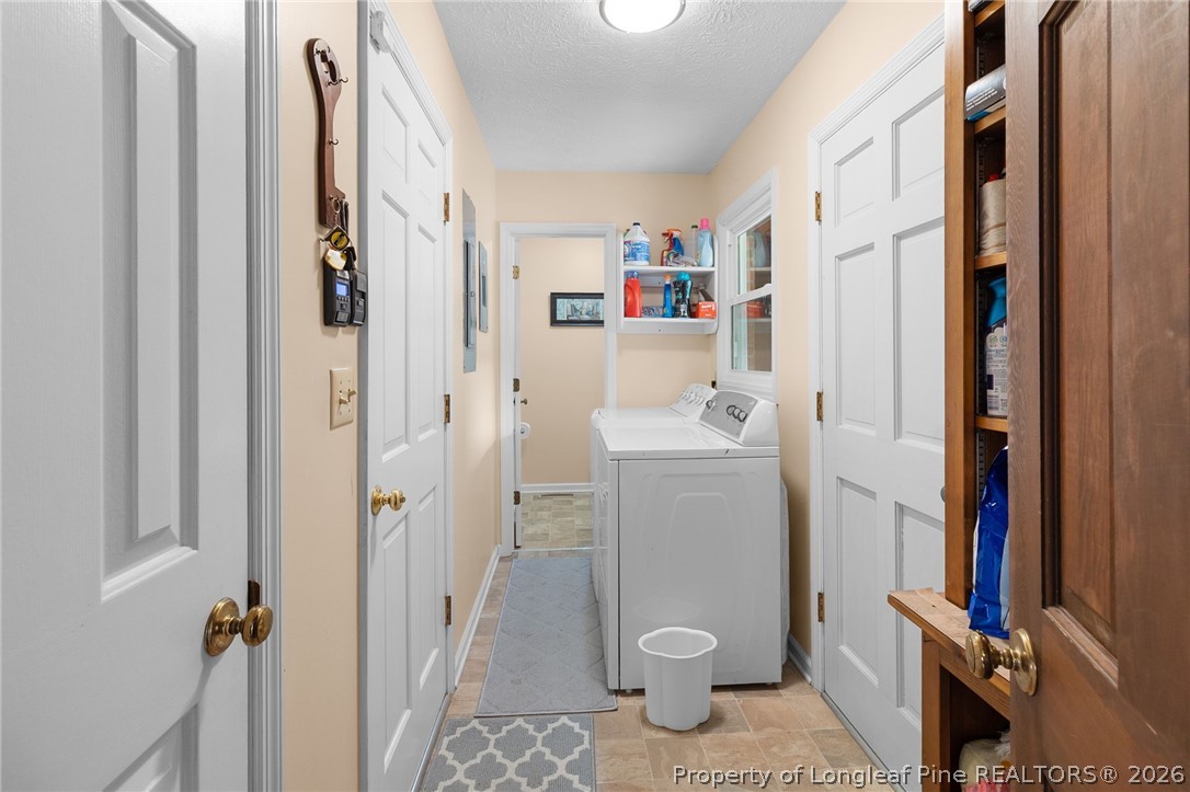 3488 School Road Fayetteville, NC 28306 - Photo 18 of 50 a bathroom with a sink toilet and shower