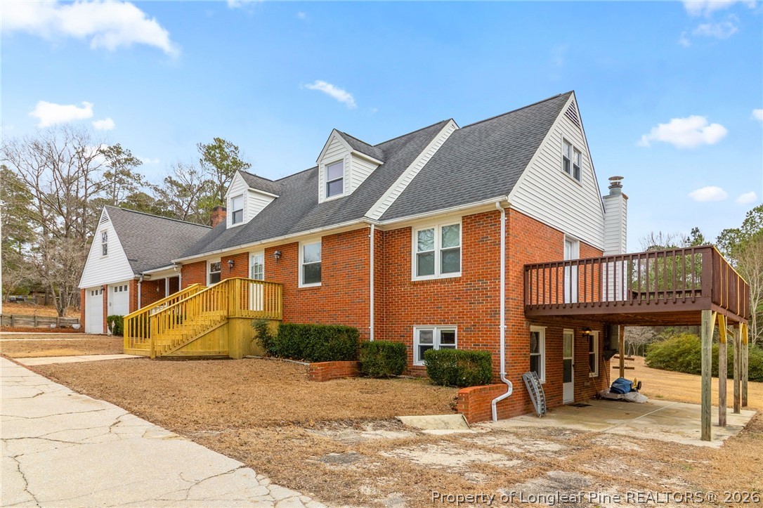 3488 School Road Fayetteville, NC 28306 - Photo 2 of 50 a front view of a house with a yard