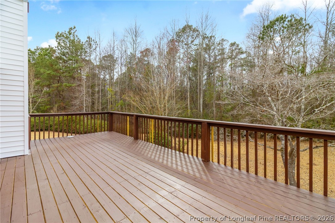 3488 School Road Fayetteville, NC 28306 - Photo 22 of 50 a view of balcony with wooden floor