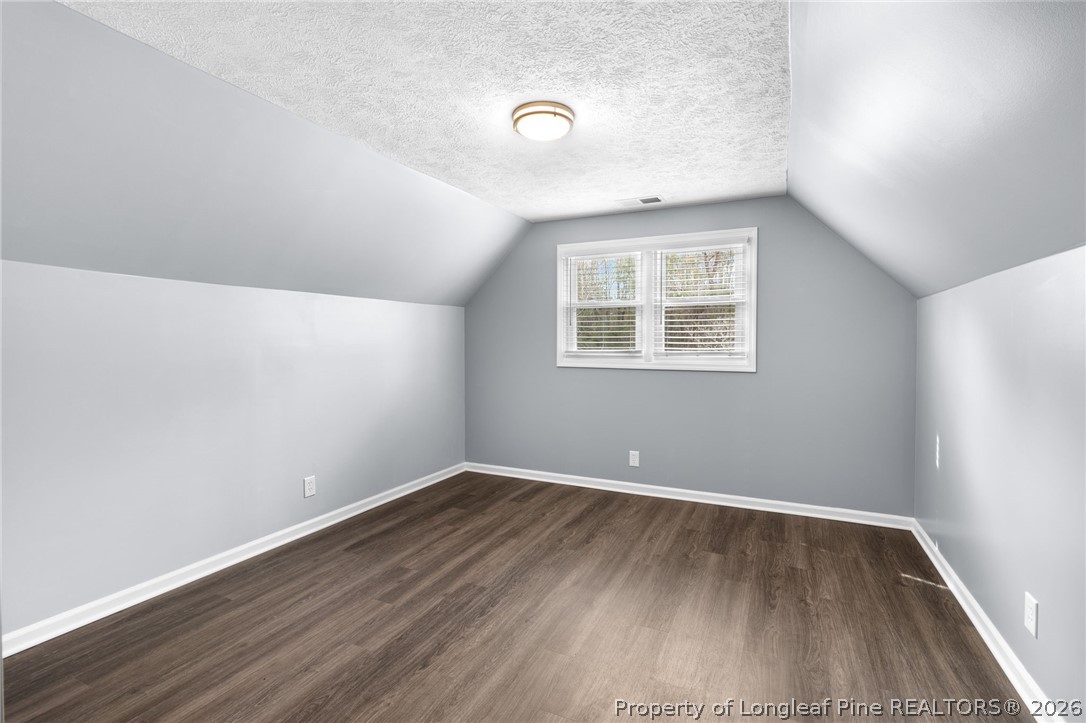 3488 School Road Fayetteville, NC 28306 - Photo 32 of 50 wooden floor in an empty room with a window