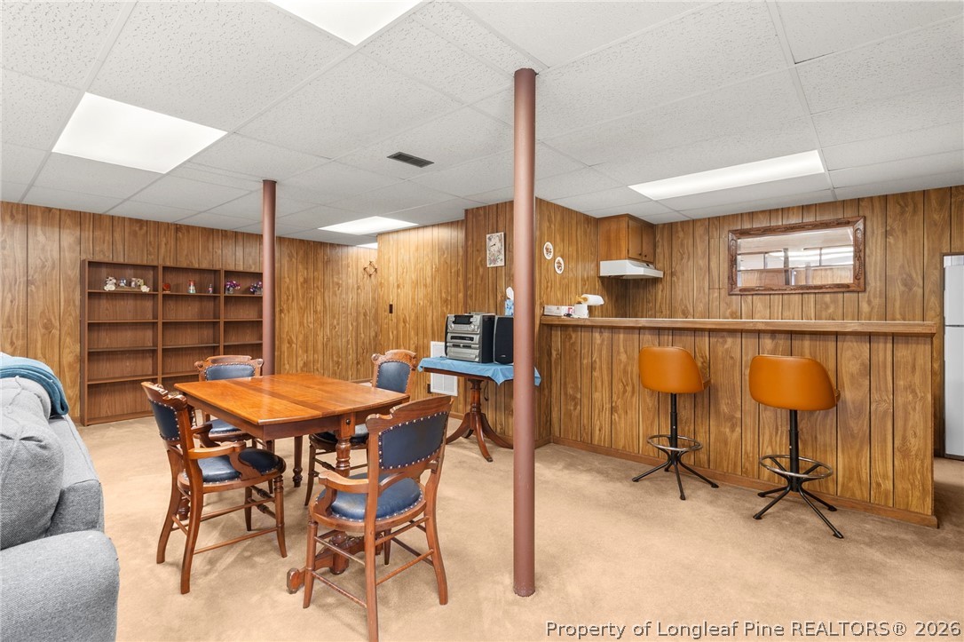 3488 School Road Fayetteville, NC 28306 - Photo 36 of 50 a dinning table and chairs in a room