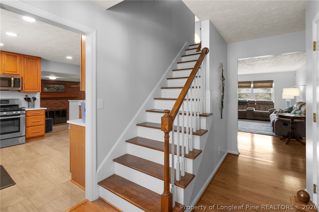 3488 School Road Fayetteville, NC 28306 - Photo 4 of 50 a view of a living room with furniture and wooden floor