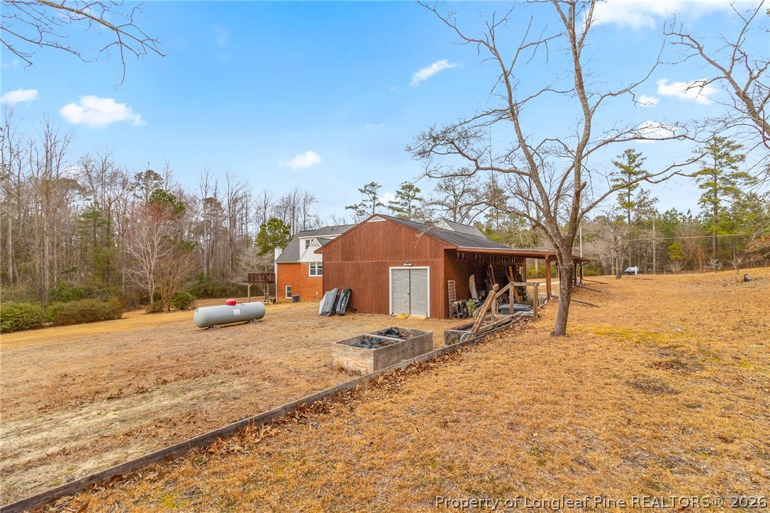 3488 School Road Fayetteville, NC 28306 - Photo 47 of 50 a view of a house with snow on the ground