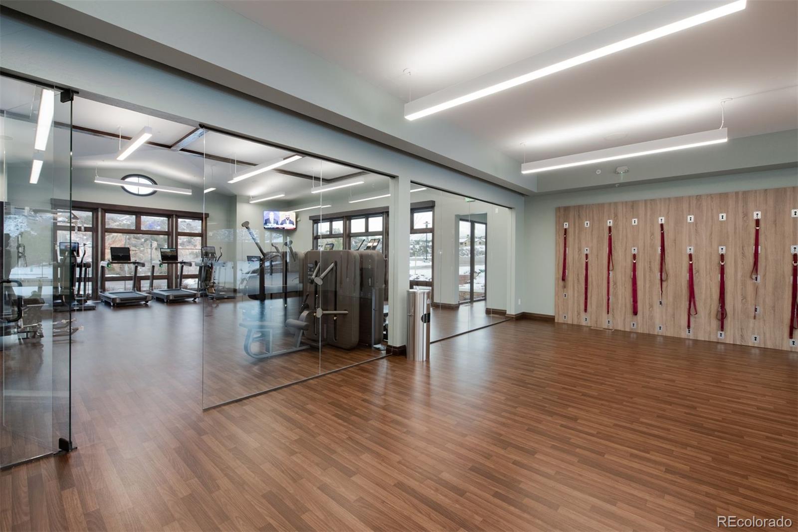 7911 Raphael Lane Littleton, CO 80125 - Photo 14 of 15 a view of a hall with wooden floor