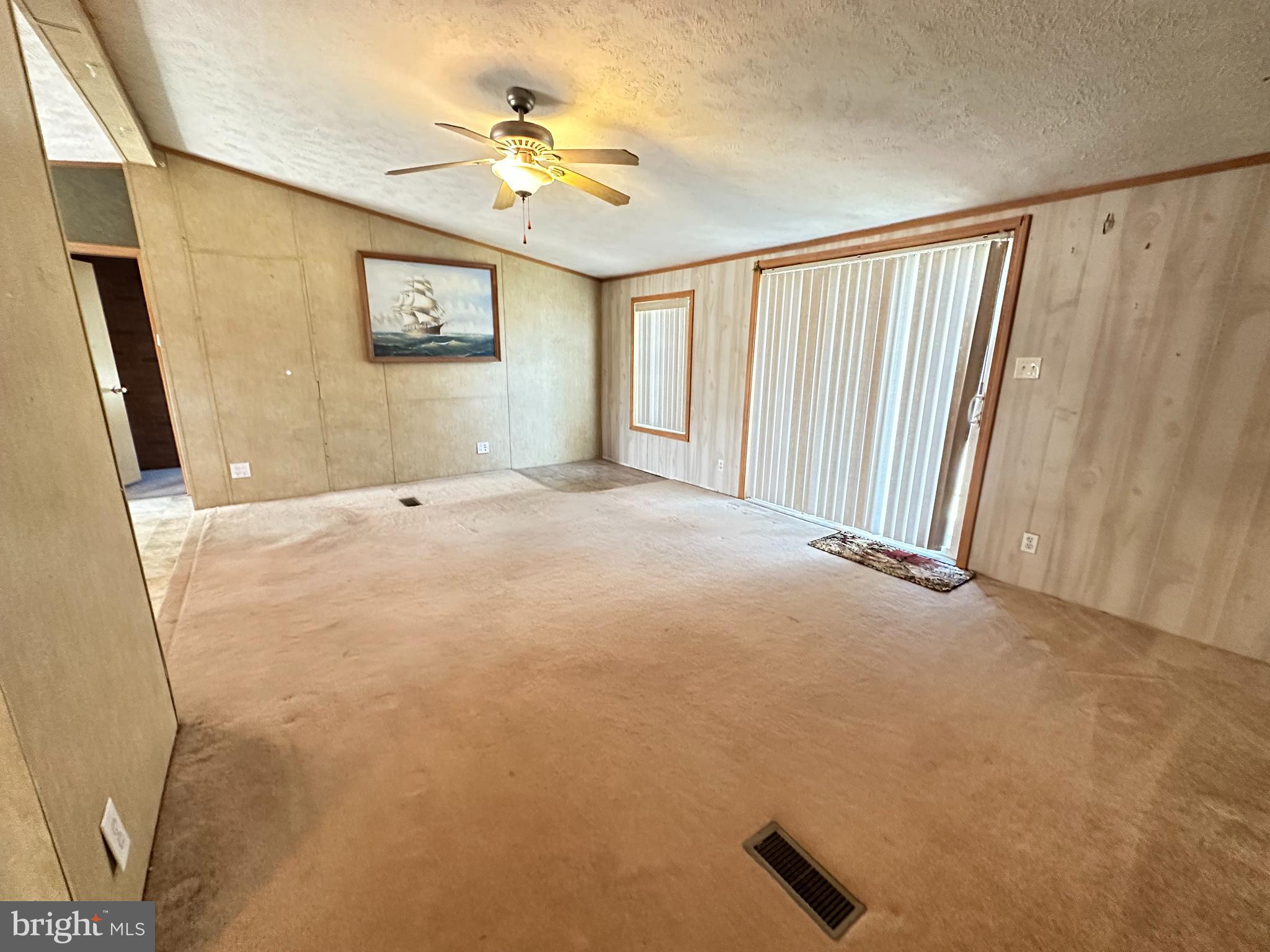 35390 Heron Road Millsboro, DE 19966 - Photo 7 of 25 a view of an empty room with a window