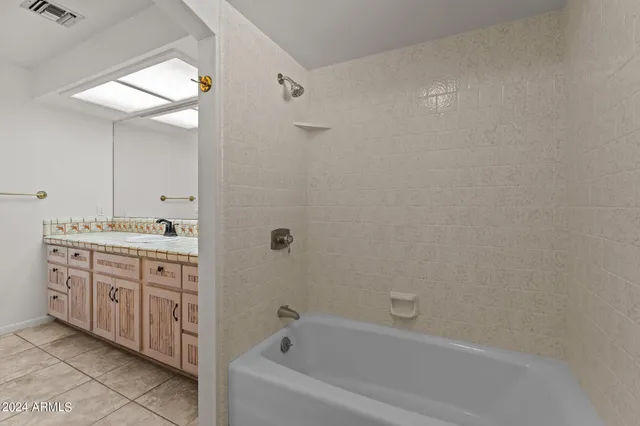 a backyard of a house with potted plants