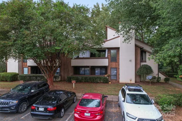 a car parked in front of a house