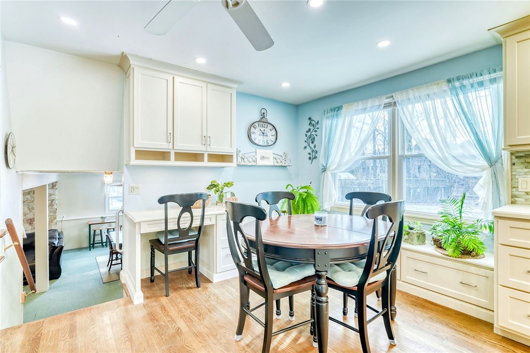 947 Copper Kettle Road Webster, NY 14580 - Photo 11 of 49 Breakfast nook with built in bench seating and des