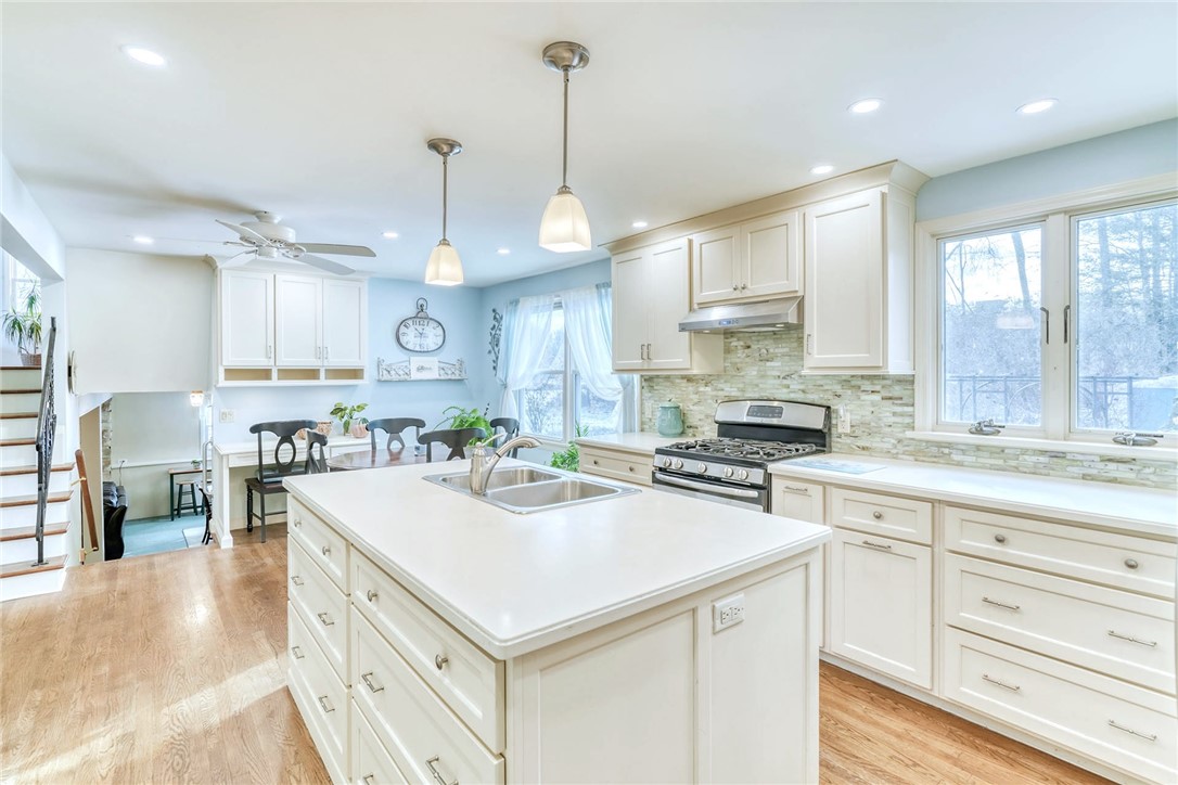 947 Copper Kettle Road Webster, NY 14580 - Photo 15 of 49 Updated Kitchen with solid surface counters and ti