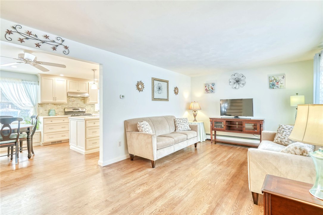 947 Copper Kettle Road Webster, NY 14580 - Photo 2 of 49 Living Room with Large picture window and hardwood