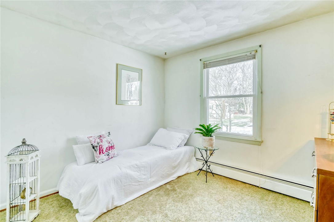 947 Copper Kettle Road Webster, NY 14580 - Photo 25 of 49 bedroom #3 (hardwoods under the carpeting)
