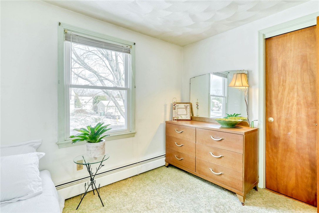 947 Copper Kettle Road Webster, NY 14580 - Photo 26 of 49 bedroom #3 (hardwoods under the carpeting)