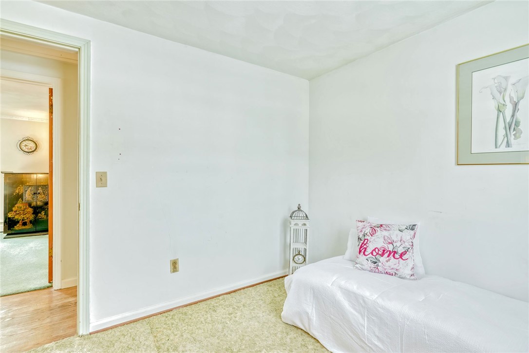947 Copper Kettle Road Webster, NY 14580 - Photo 27 of 49 bedroom #3 (hardwoods under the carpeting)