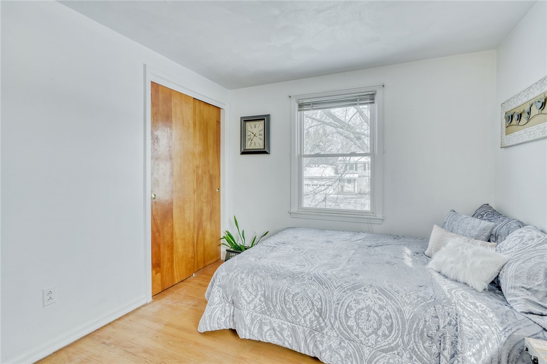 947 Copper Kettle Road Webster, NY 14580 - Photo 30 of 49 Bedroom #2 with hardwood floors.