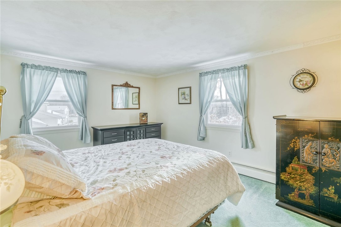 947 Copper Kettle Road Webster, NY 14580 - Photo 31 of 49 Primary Bedroom with hardwood floors under the car