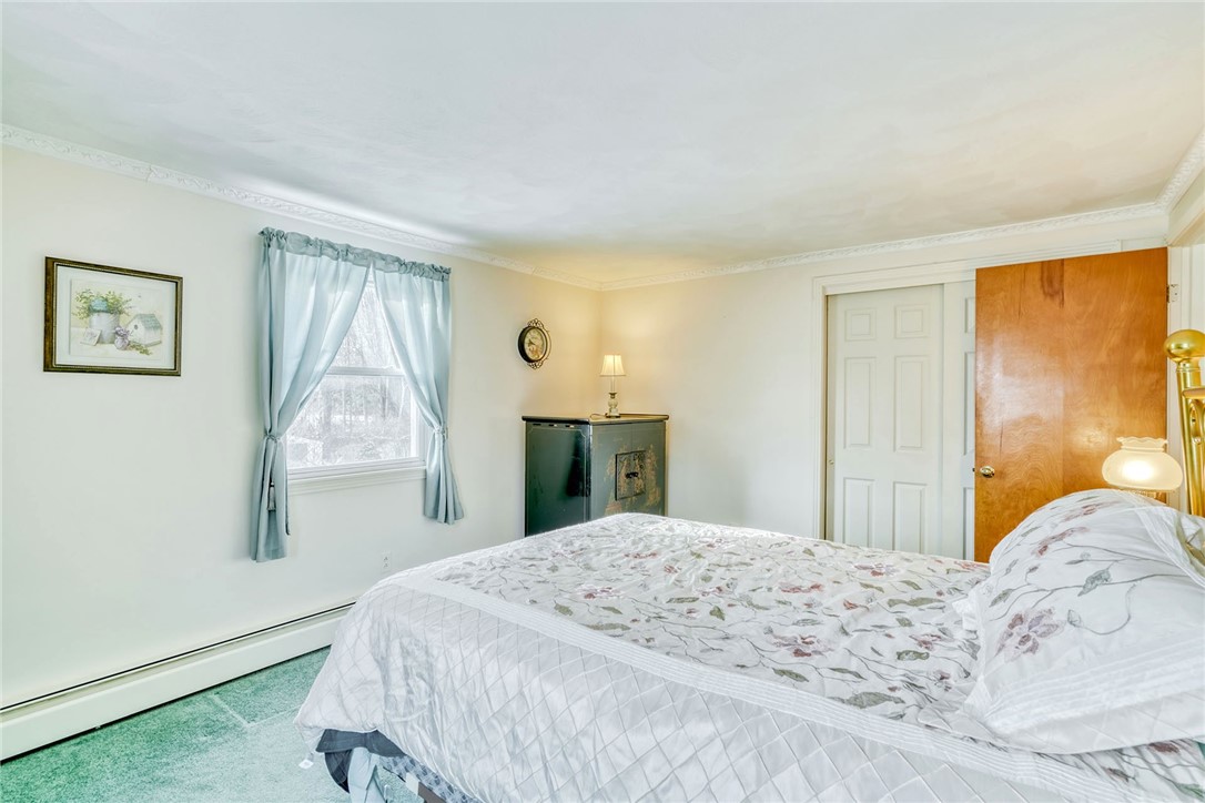 947 Copper Kettle Road Webster, NY 14580 - Photo 33 of 49 Primary Bedroom with hardwood floors under the car