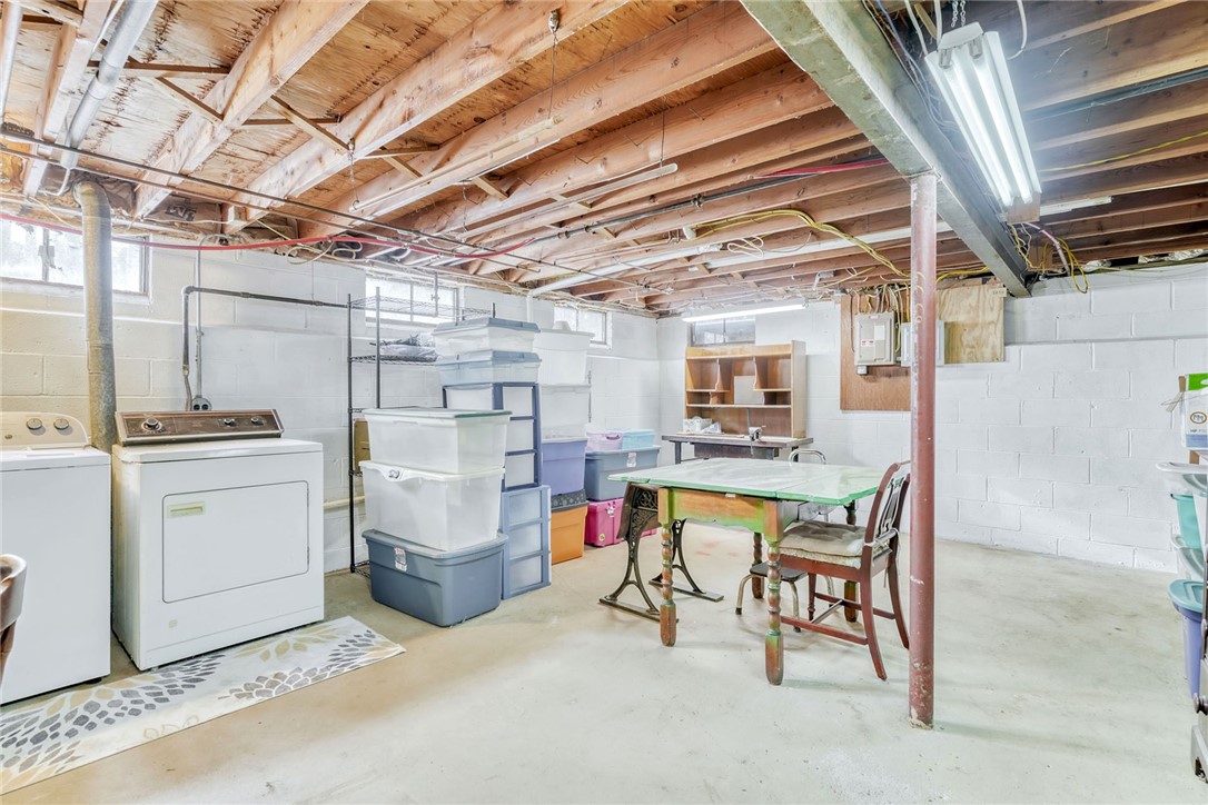 947 Copper Kettle Road Webster, NY 14580 - Photo 37 of 49 Partial basement with laundry and storage area.