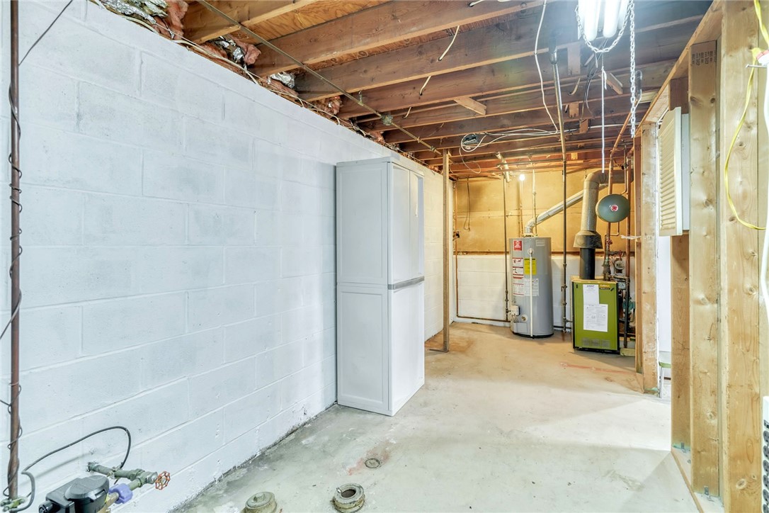 947 Copper Kettle Road Webster, NY 14580 - Photo 39 of 49 partial basement with laundry and storage area.
