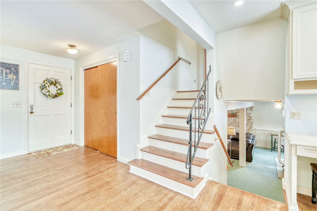 947 Copper Kettle Road Webster, NY 14580 - Photo 7 of 49 Entryway and staircases leading to bedrooms and do