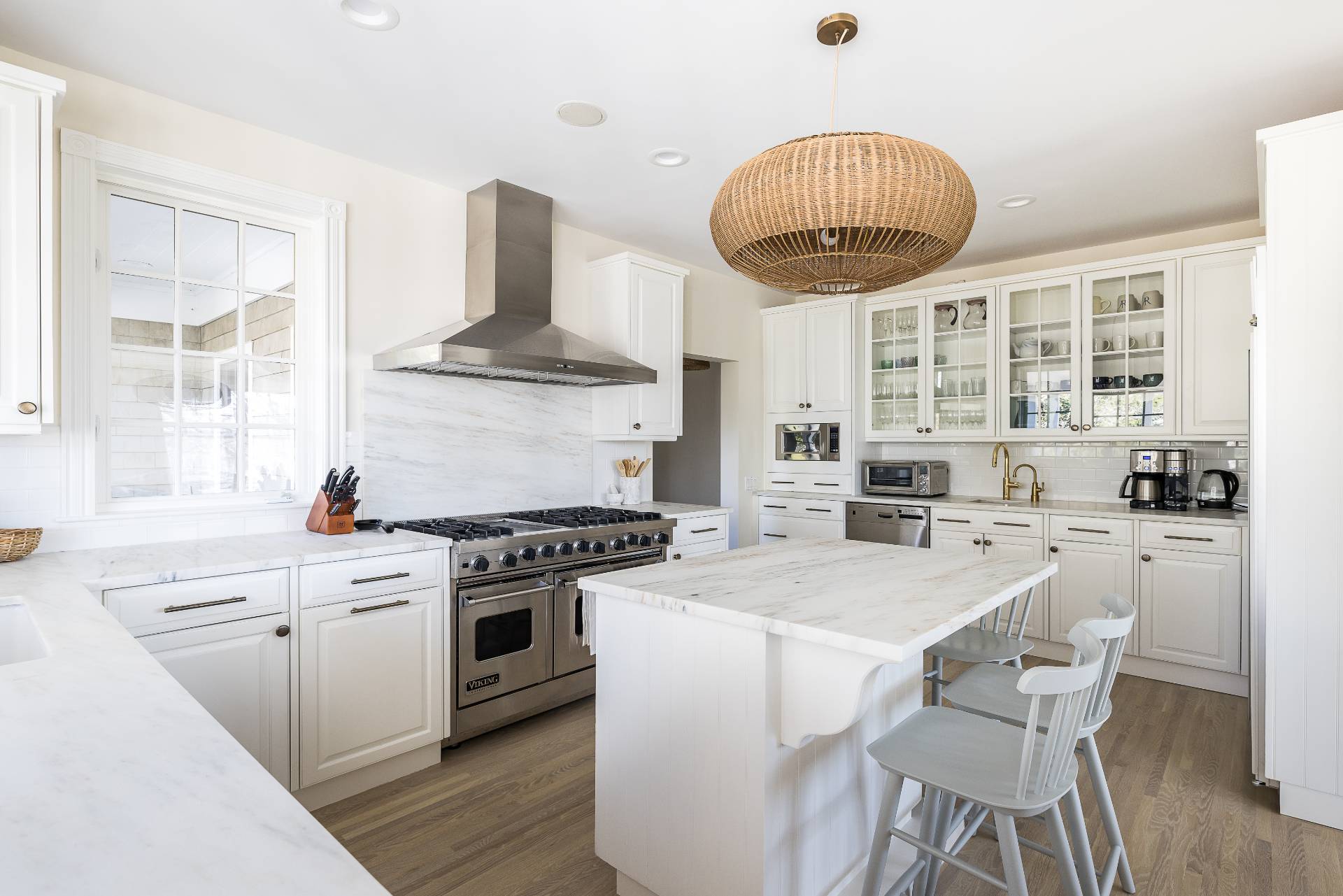 5 Mill Path Bridgehampton, NY 11963 - Photo 11 of 31 a kitchen with a stove window and cabinets