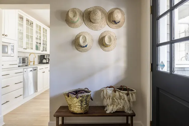a view of a hallway with washer and dryer