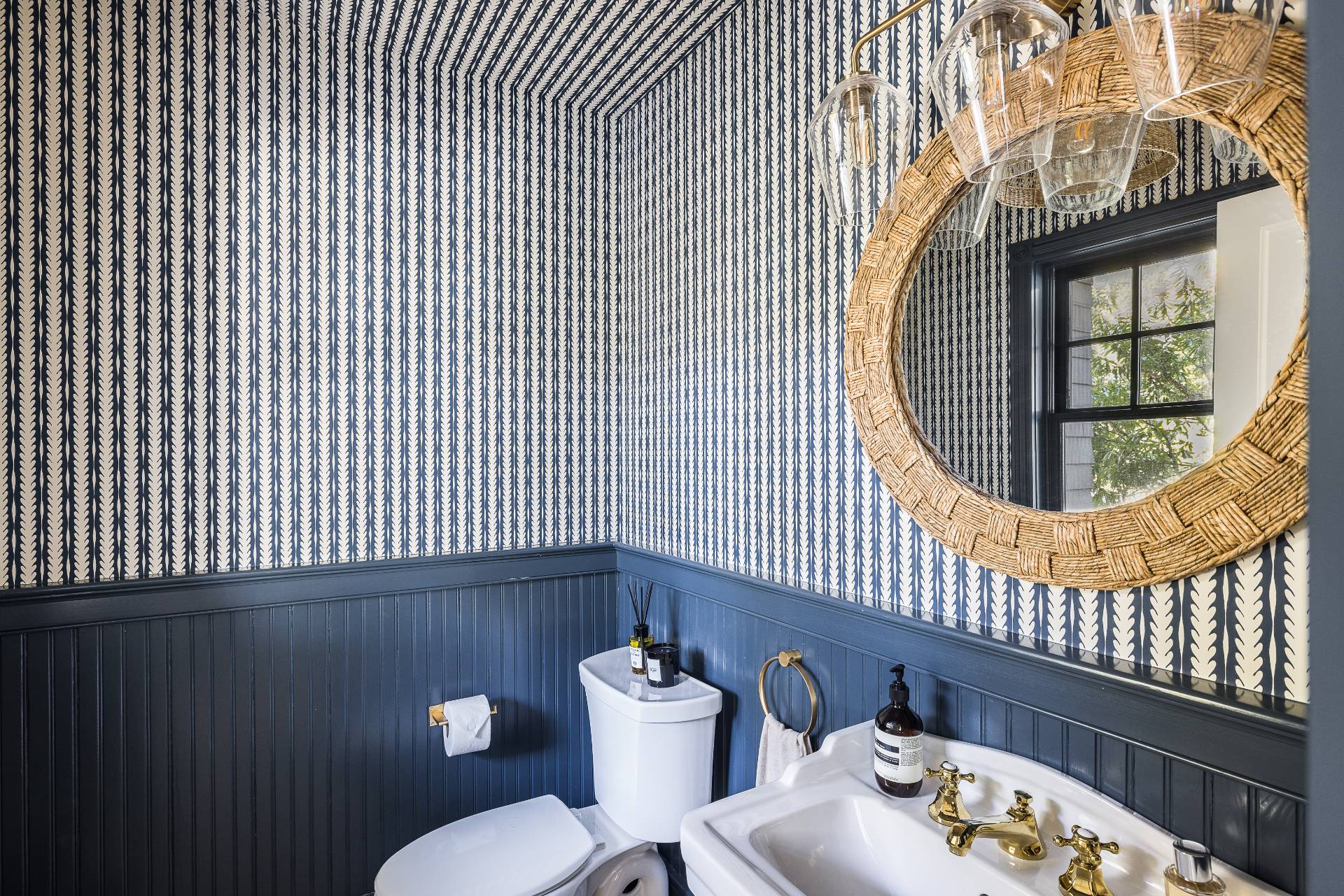 5 Mill Path Bridgehampton, NY 11963 - Photo 16 of 31 a bathroom with a sink a mirror and a toilet