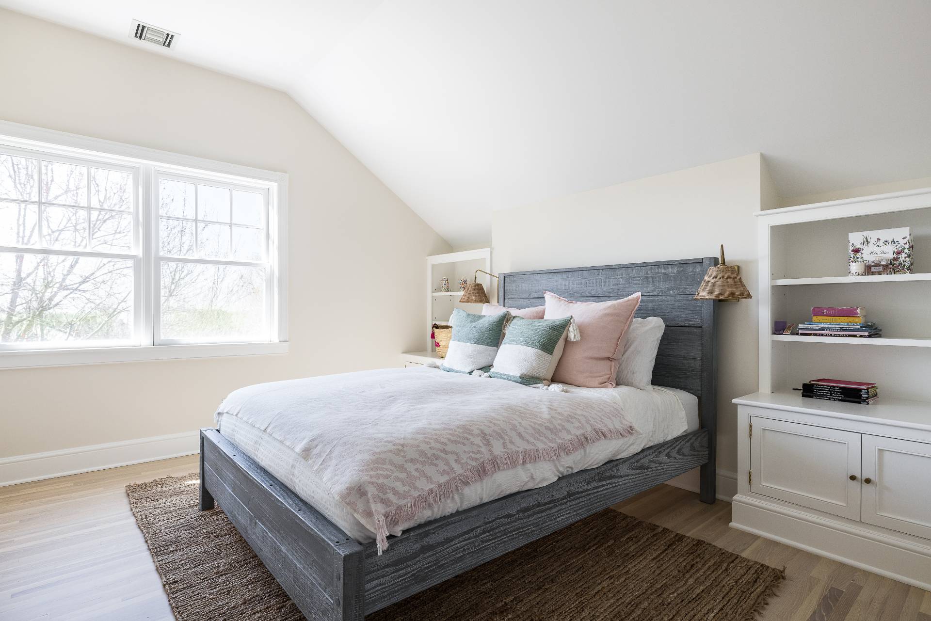 5 Mill Path Bridgehampton, NY 11963 - Photo 18 of 31 a bedroom with a bed and window