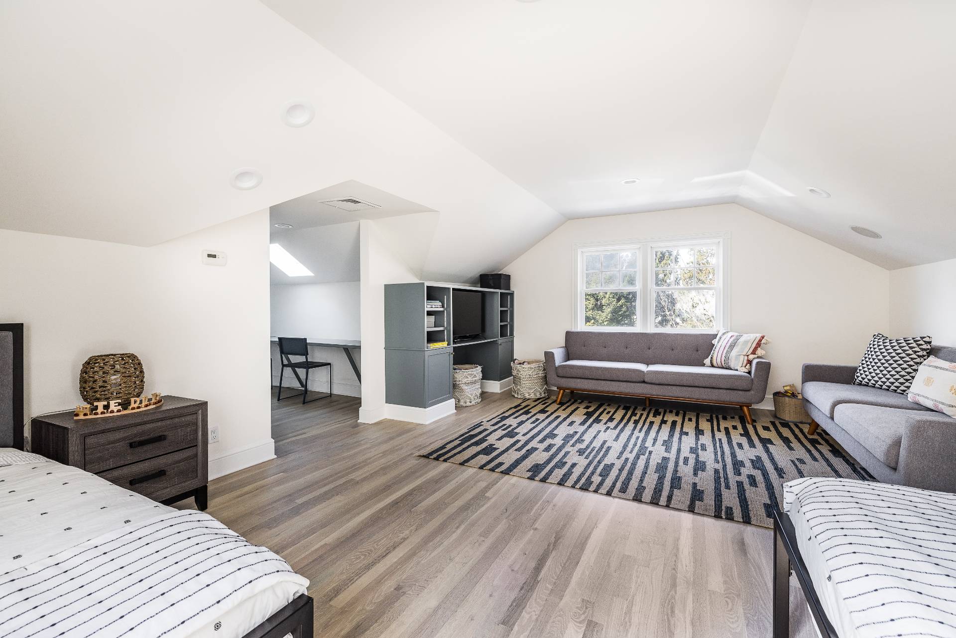 5 Mill Path Bridgehampton, NY 11963 - Photo 21 of 31 a living room with furniture and a couch