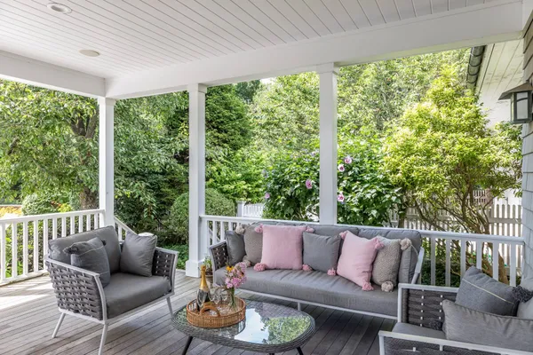 a living room with furniture and windows