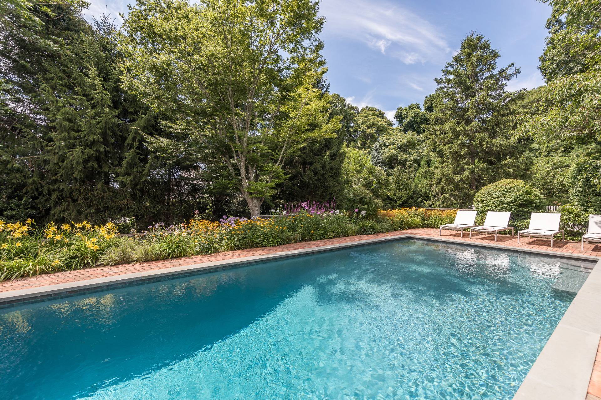 5 Mill Path Bridgehampton, NY 11963 - Photo 3 of 31 a view of swimming pool from a yard
