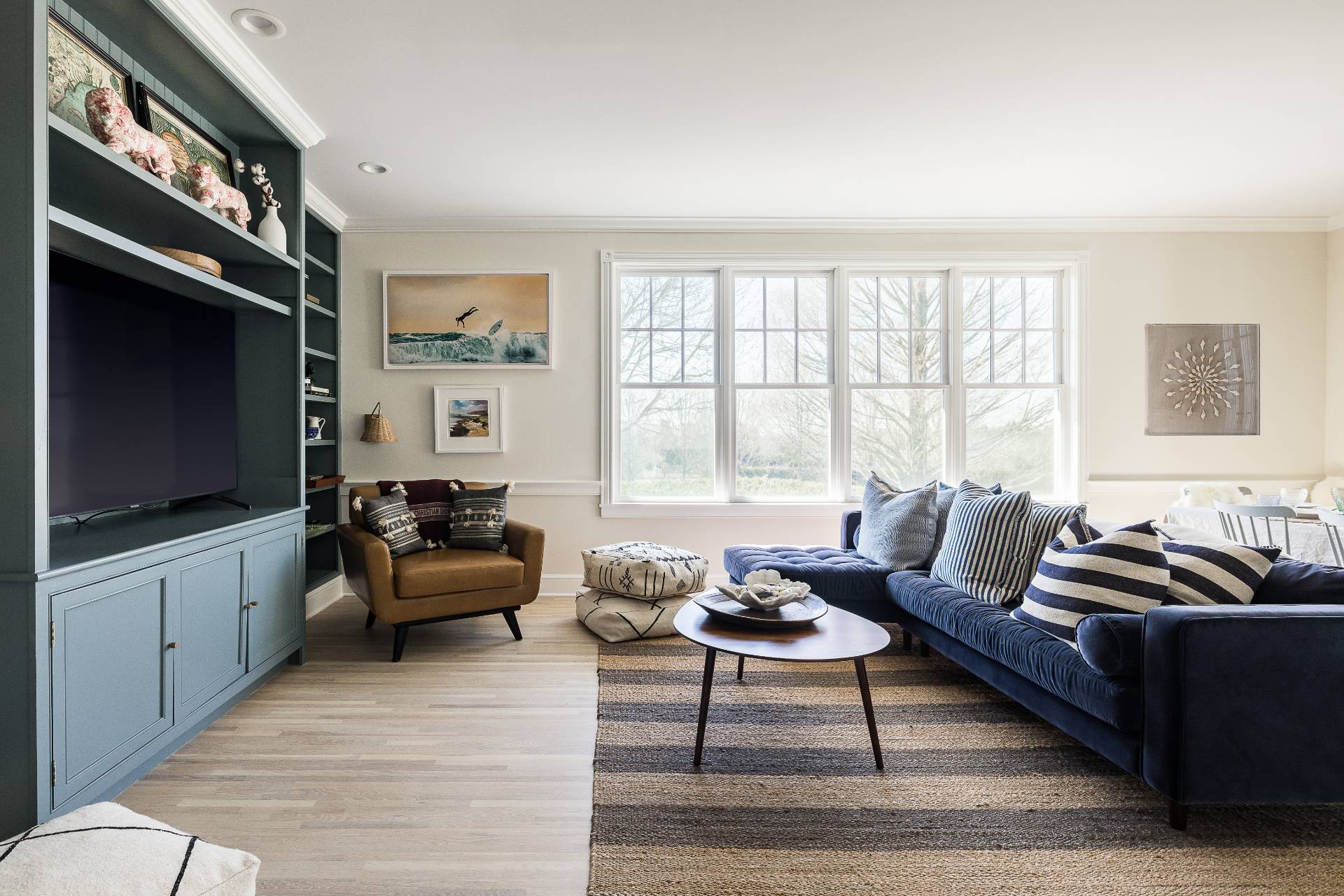 5 Mill Path Bridgehampton, NY 11963 - Photo 8 of 31 a living room with furniture a flat screen tv and a window