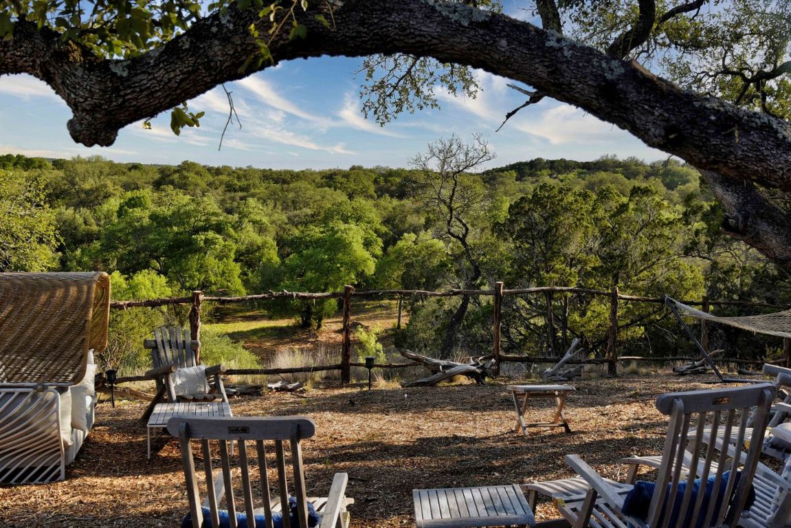 a view of swimming pool with a patio