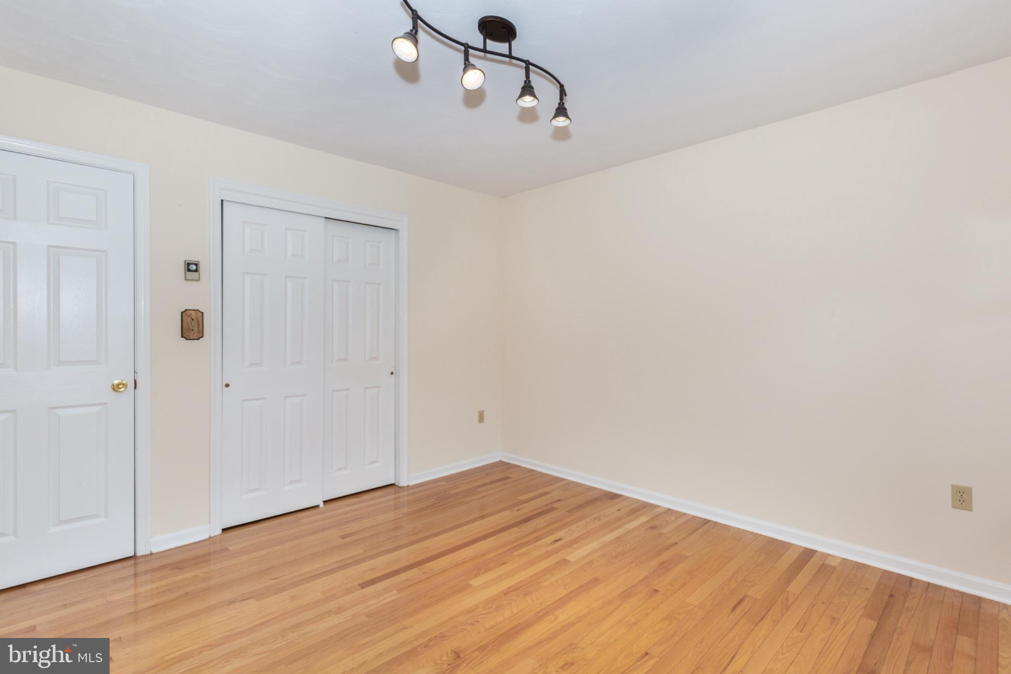 544 Uniontown Road Westminster, MD 21158 - Photo 27 of 51 Spacious room with warm wood floors.
