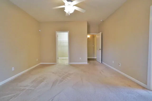 a bathroom with a double vanity sink mirror and double