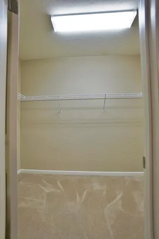 a view of entryway and kitchen