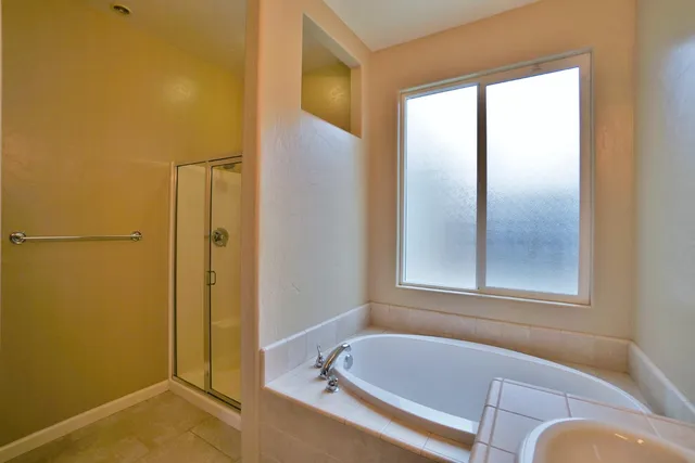 a view of an empty room with windows