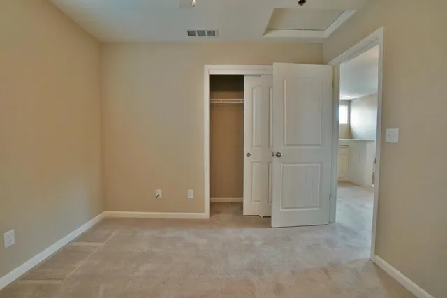 a view of backyard with green space