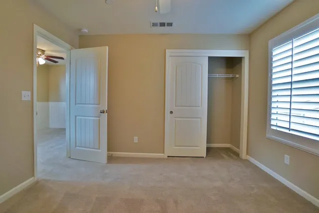 a front view of house with garden