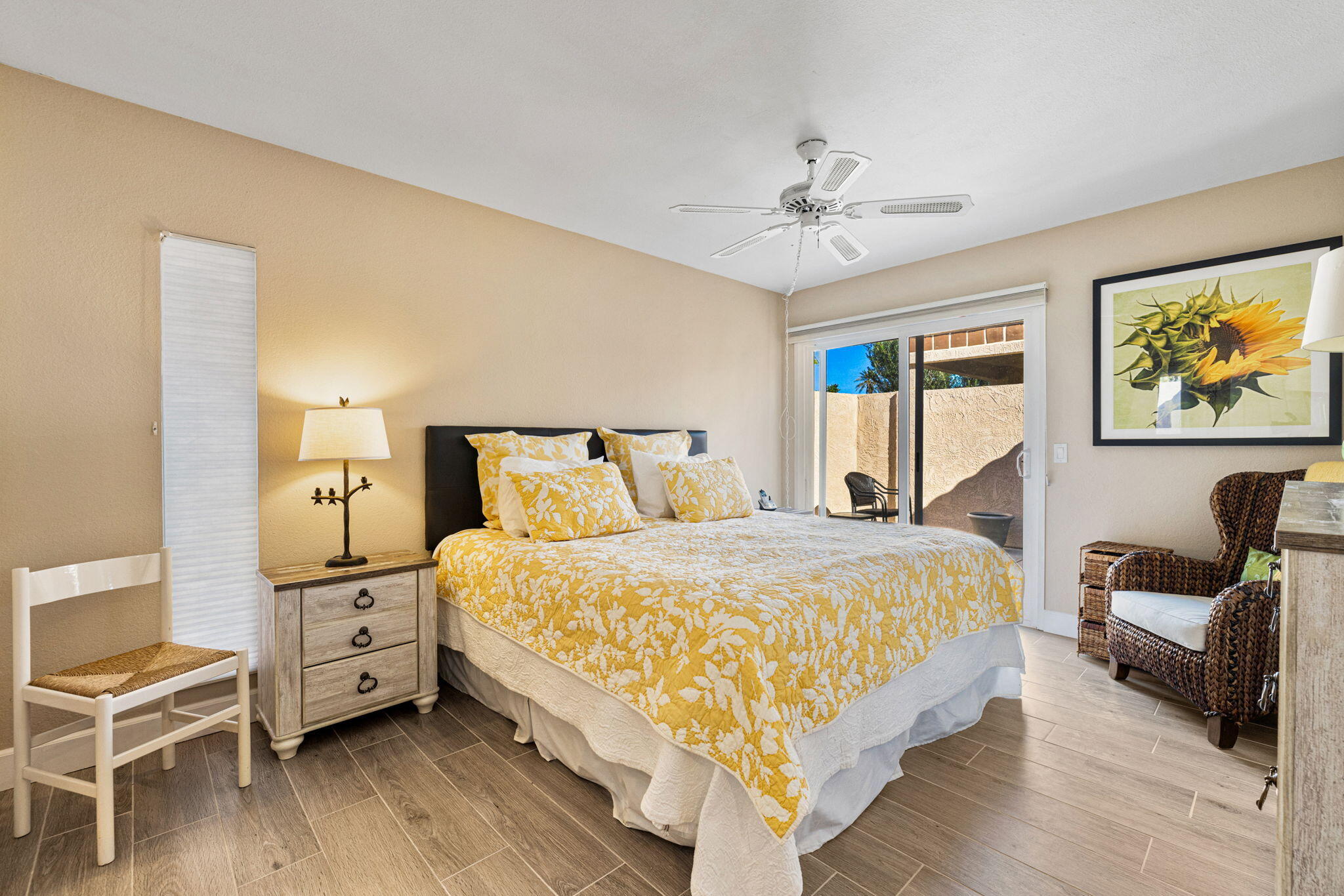 49091 Taylor Street Indio, CA 92201 - Photo 19 of 49 a bedroom with a bed and a chandelier