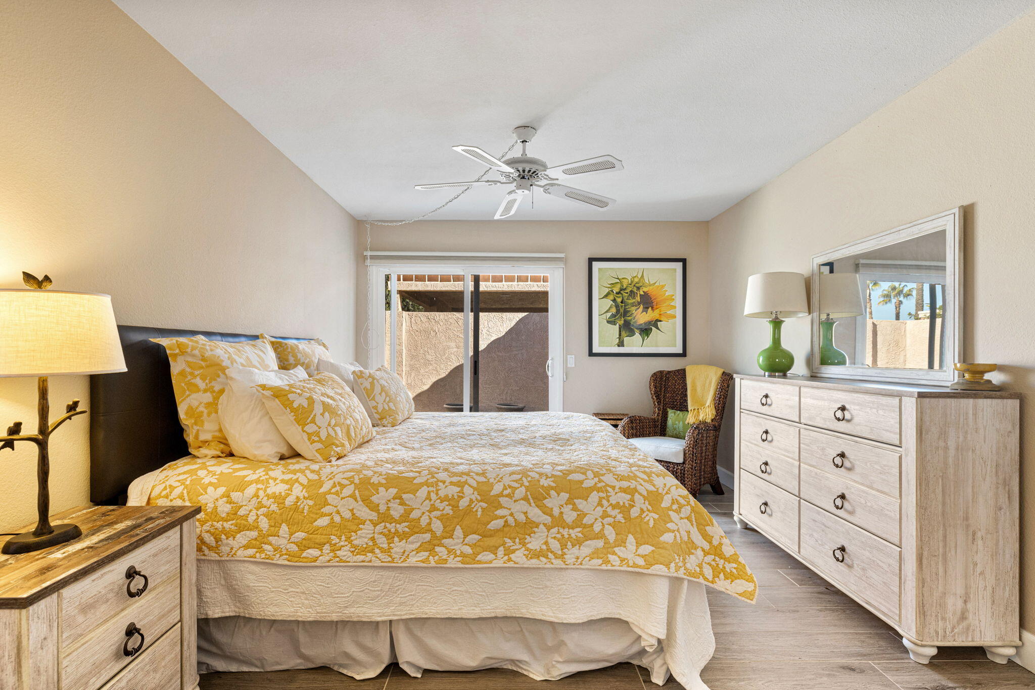 49091 Taylor Street Indio, CA 92201 - Photo 21 of 49 a bedroom with a bed and wooden floor